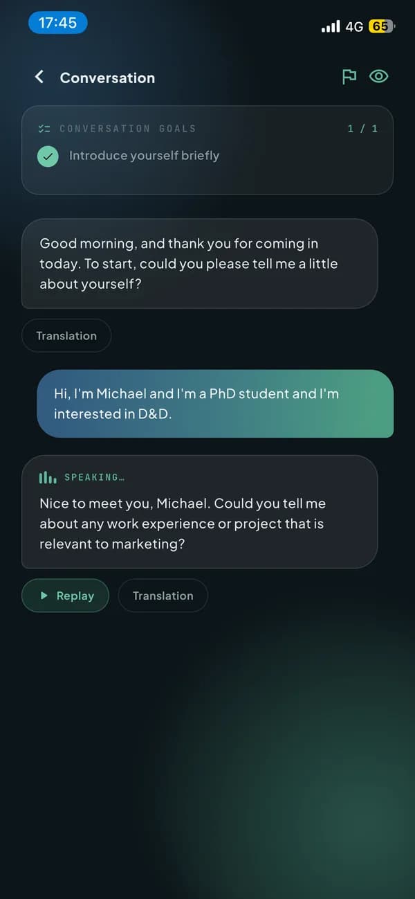 The Inqui app during a conversation, showing goals, the AI reply and a translation